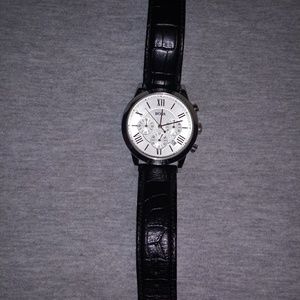 Men's Hugo Boss watch.